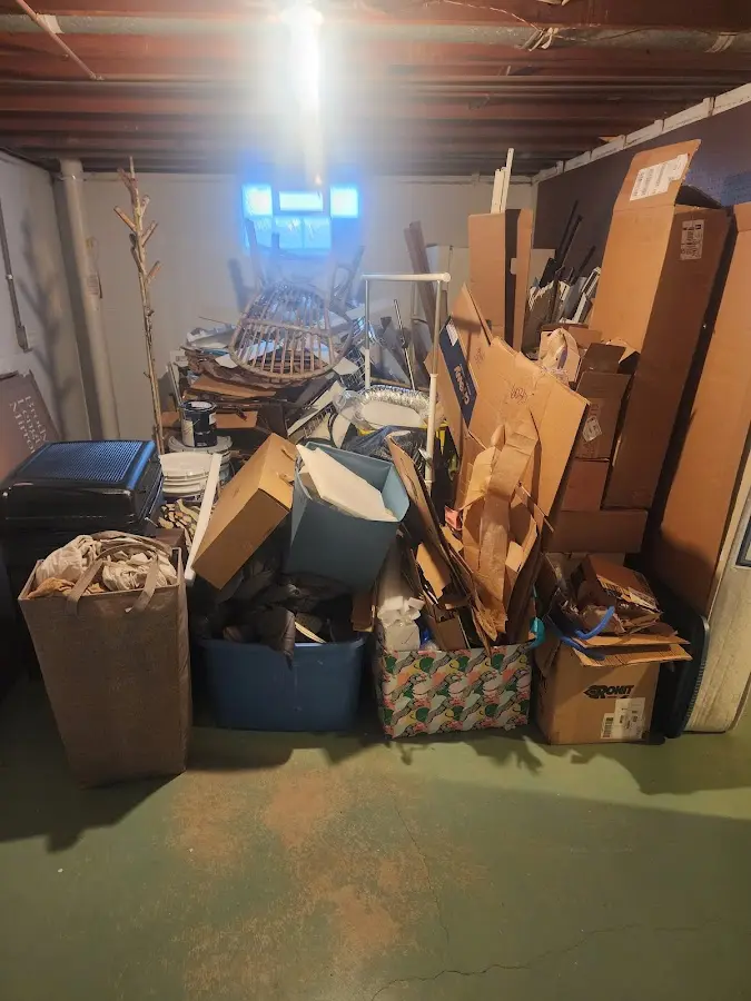 Roll-off dumpster container at job site for 2 Yard Dumpster Rental in DeLand